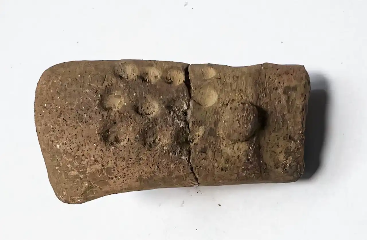 ancient-clay-figurine.png